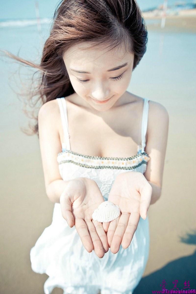 清新长裙少女海边甜美小性感高清唯美图片